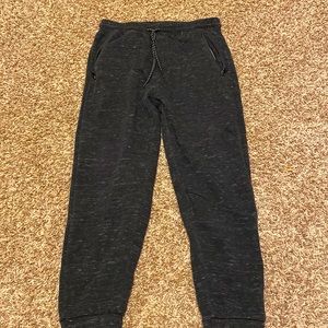 Black oceans current joggers with zip up back and front pockets